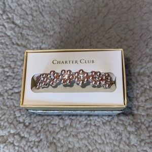 Silver bracelet with pink pearl like flowers. Never worn